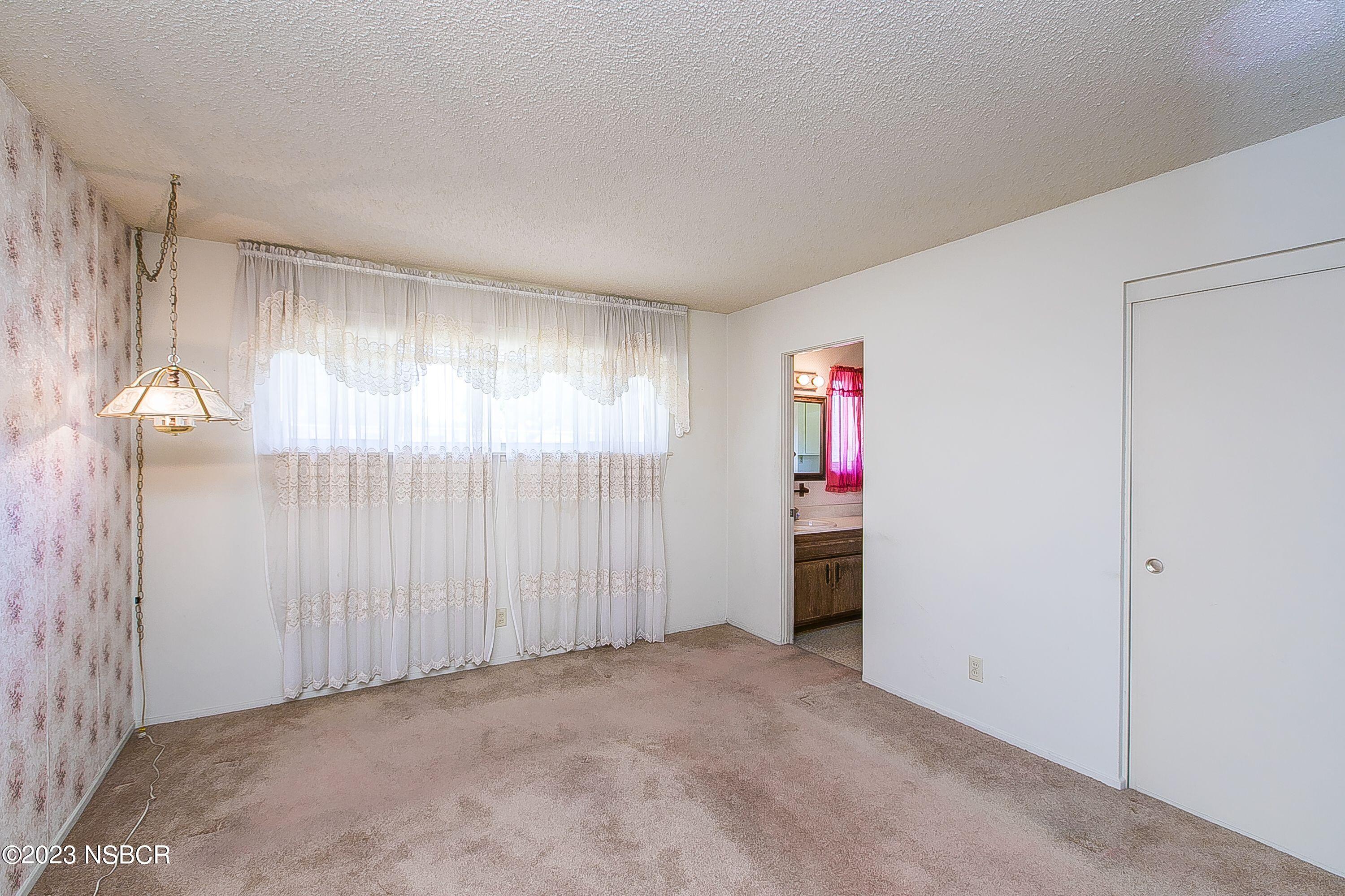 4071 Rigel Avenue Lompoc, CA 93436 - Photo 13 of 24 an empty room with windows