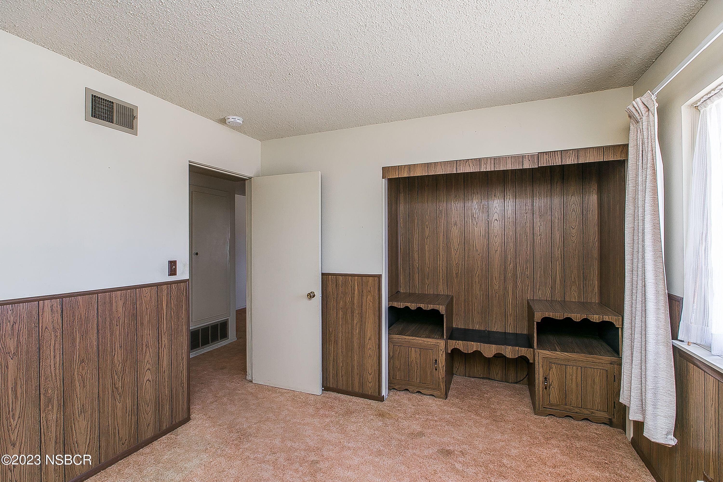 4071 Rigel Avenue Lompoc, CA 93436 - Photo 18 of 24 an empty room with a chair