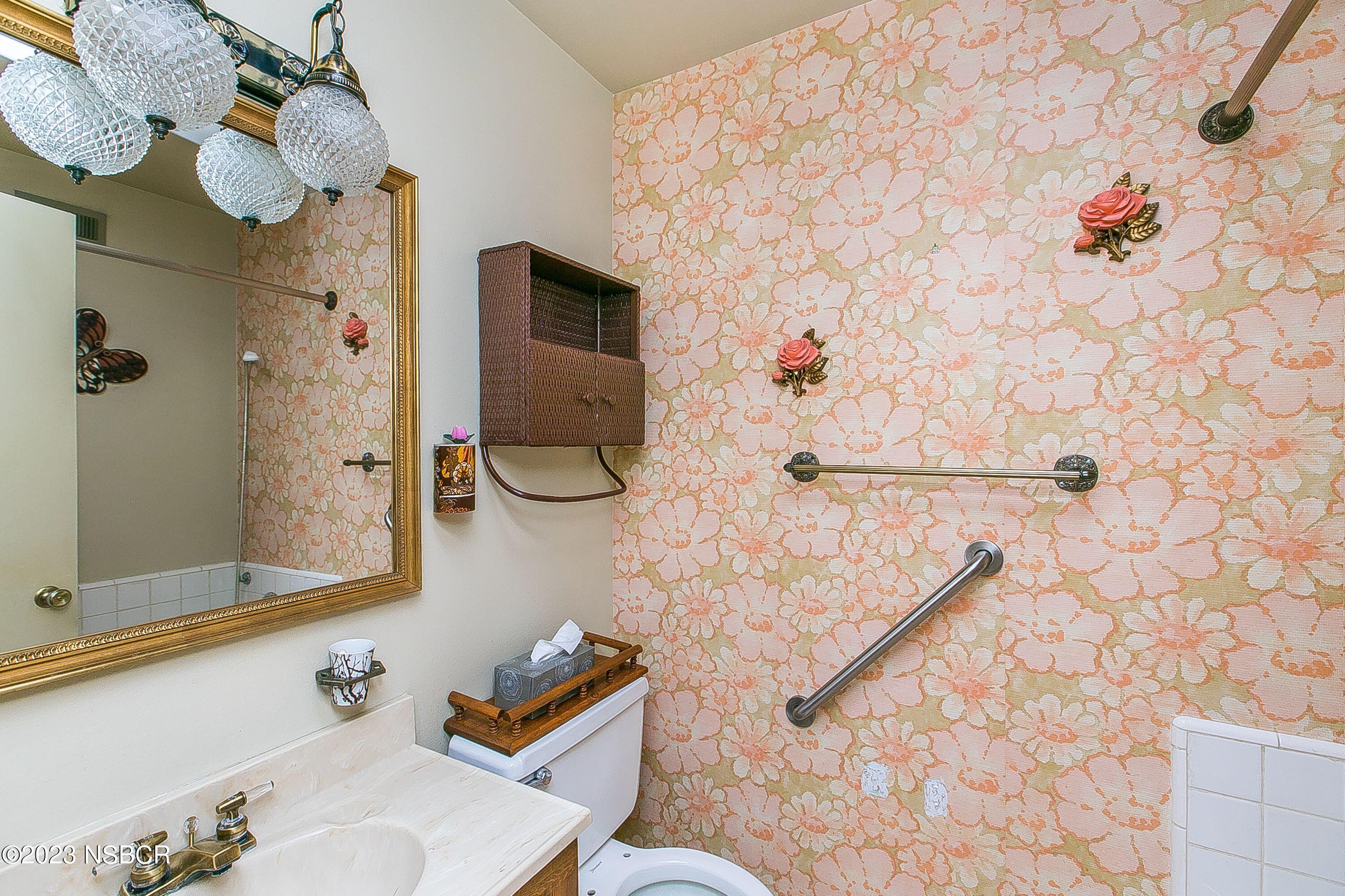 4071 Rigel Avenue Lompoc, CA 93436 - Photo 19 of 24 a bathroom with a sink toilet and shower