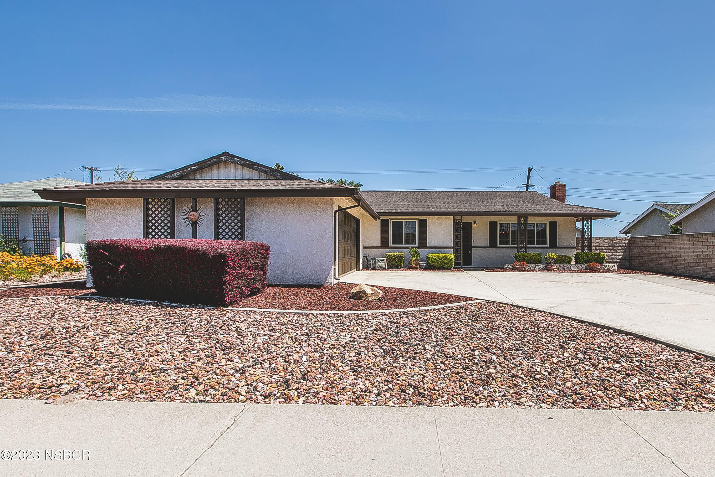 4071 Rigel Avenue Lompoc, CA 93436 - Photo 2 of 24 a front view of a house with a yard