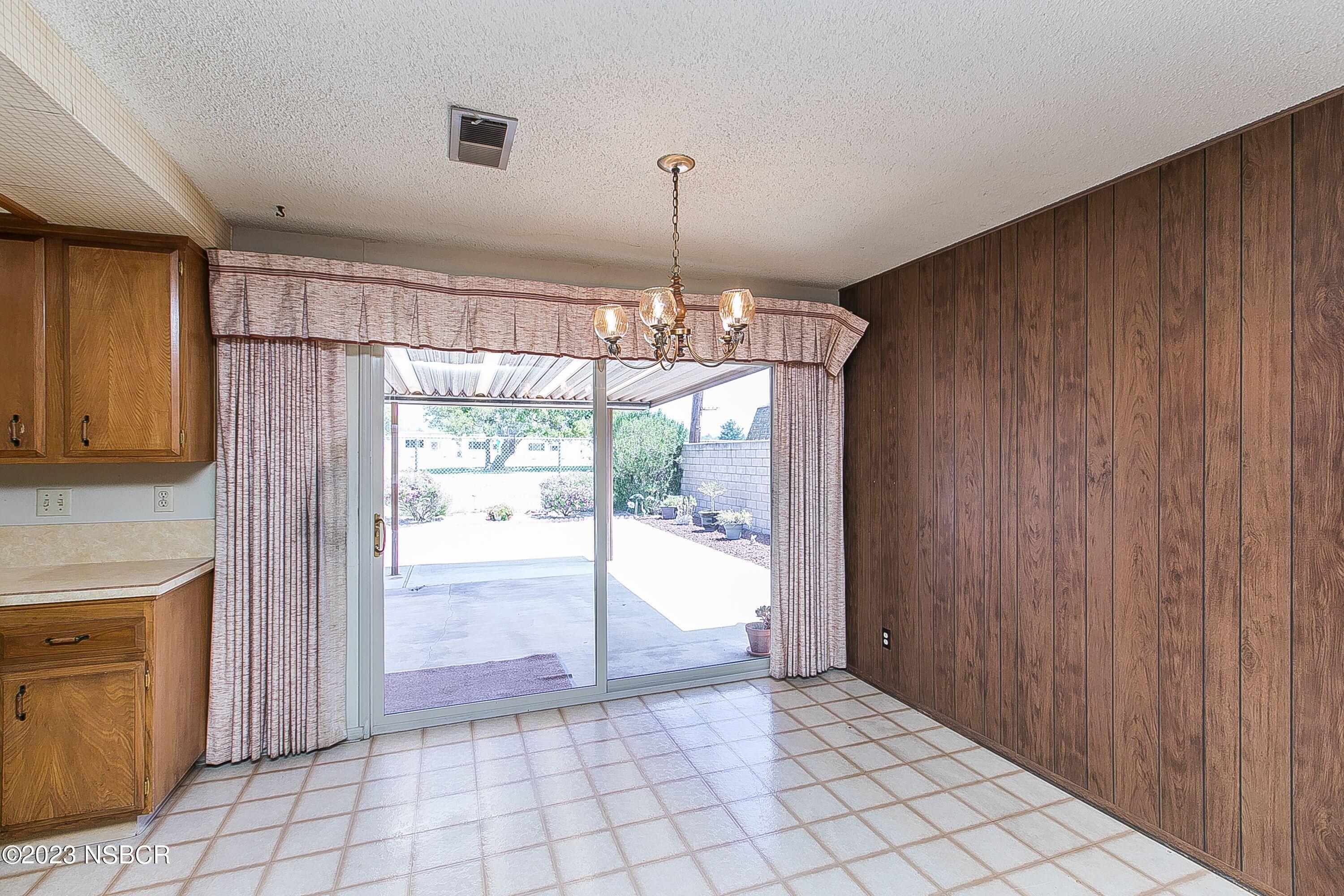 4071 Rigel Avenue Lompoc, CA 93436 - Photo 6 of 24 a view of a room with window and chandelier