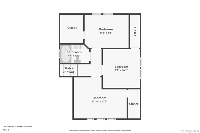 a view of a chair and table in backyard of the house