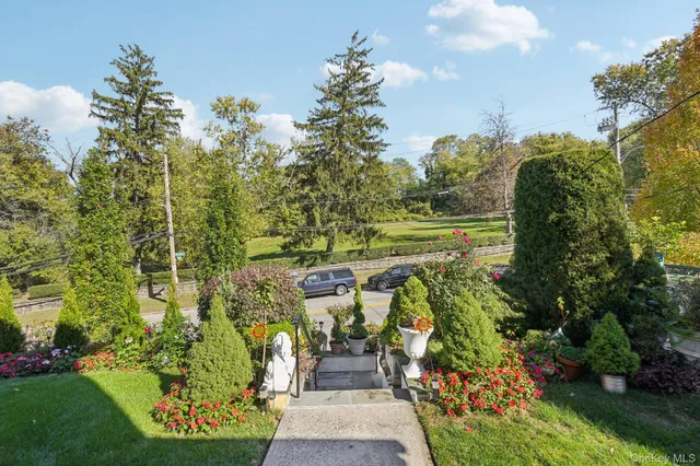 a front view of a house with outdoor space