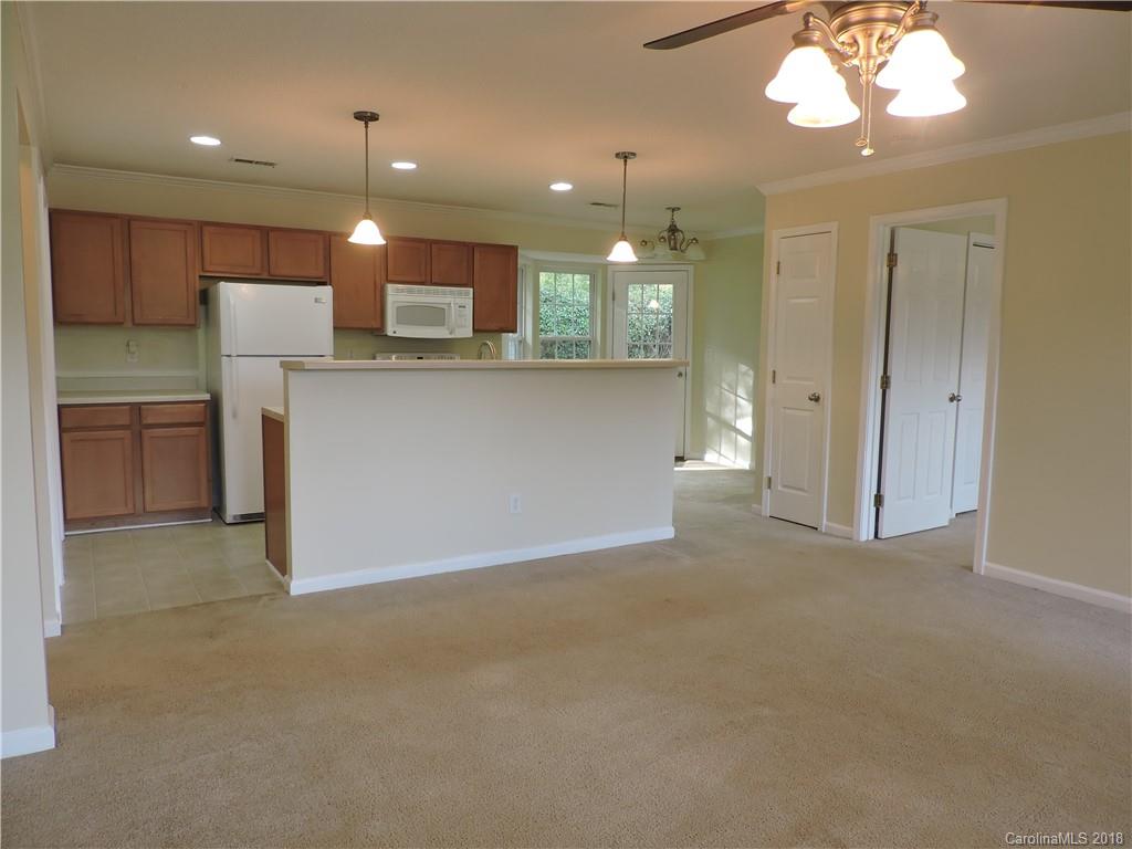 598 Lickstone Road Waynesville, NC 28786 - Photo 13 of 32 a view of kitchen and a microwave
