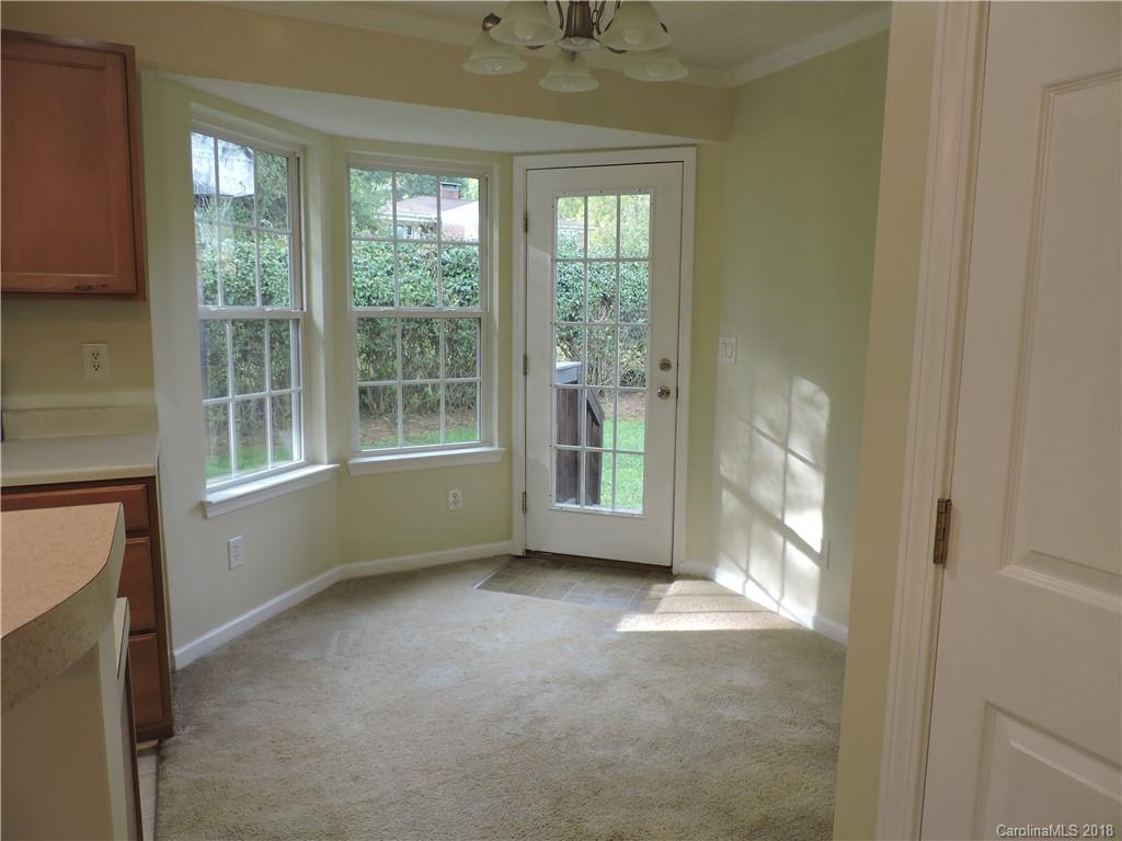 598 Lickstone Road Waynesville, NC 28786 - Photo 14 of 32 a view of an empty room with a window