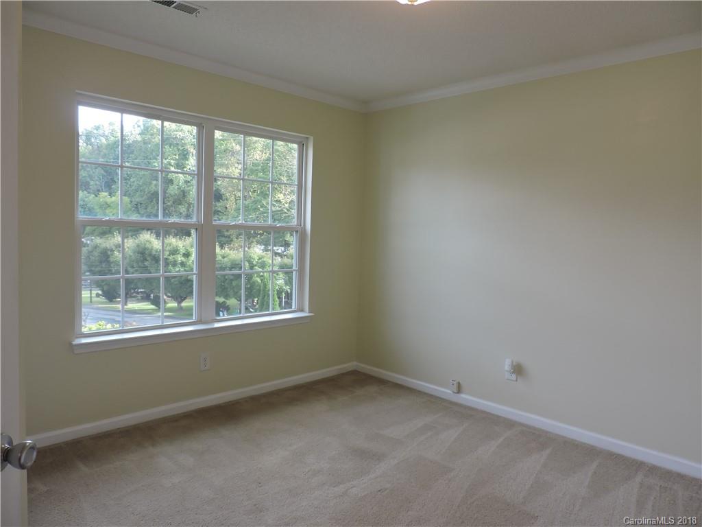 598 Lickstone Road Waynesville, NC 28786 - Photo 18 of 32 an empty room with a window
