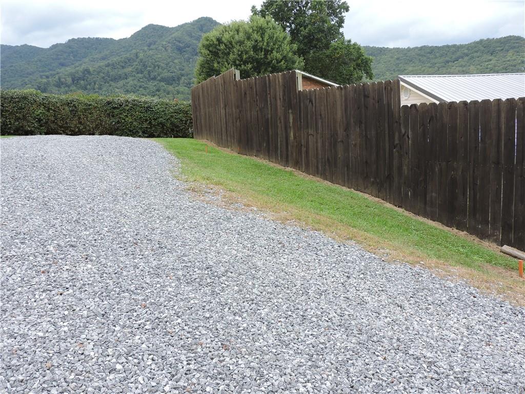 598 Lickstone Road Waynesville, NC 28786 - Photo 32 of 32 a view of a backyard with green space