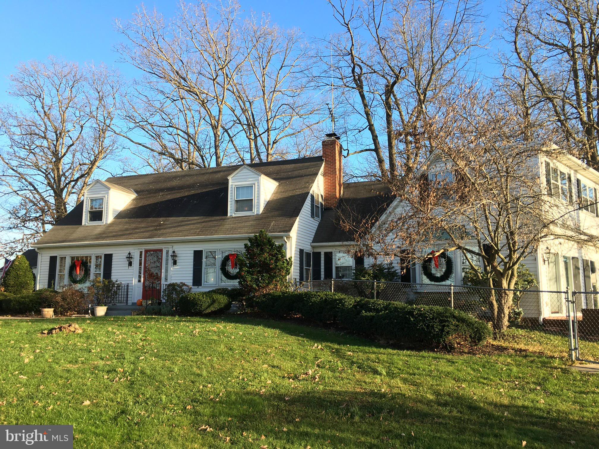 5207 Middleburg Road Union Bridge, MD 21791 - Photo 1 of 30 a front view of a house with a yard garage and trees