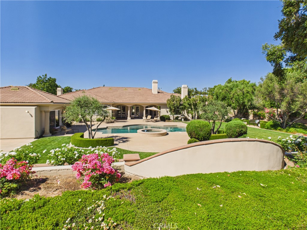 1662 Cherokee Road Corona, CA 92881 - Photo 51 of 60 a swimming pool with outdoor seating and yard