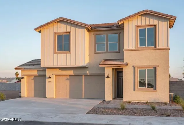 a front view of a house with yard