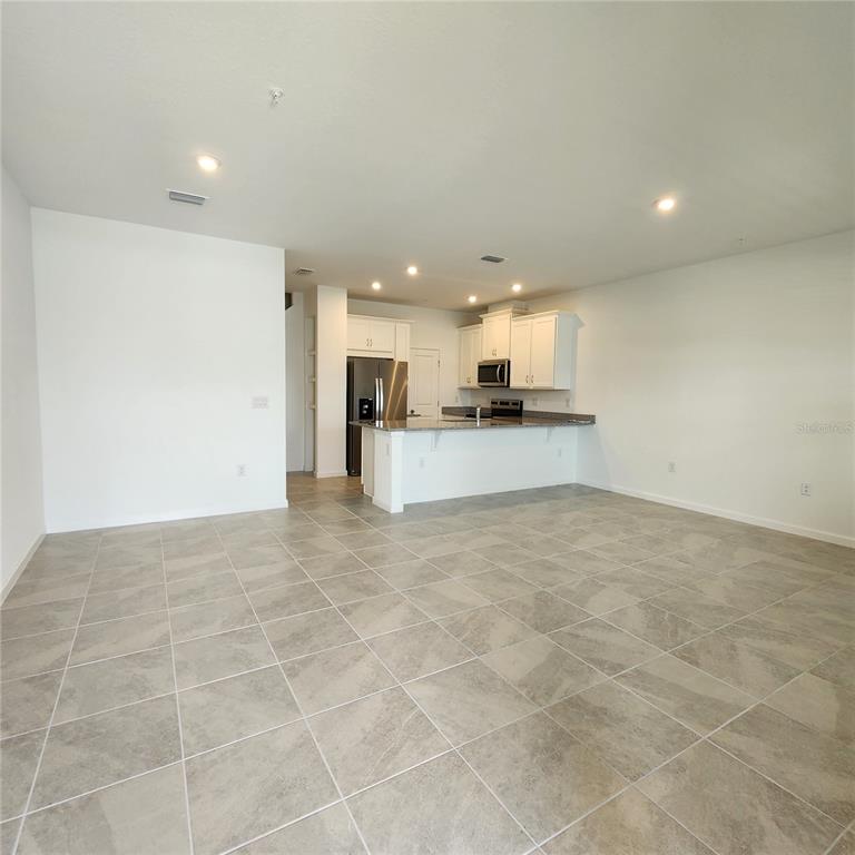 4232 Sadler Road Apopka, FL 32712 - Photo 3 of 31 a view of a kitchen with a sink