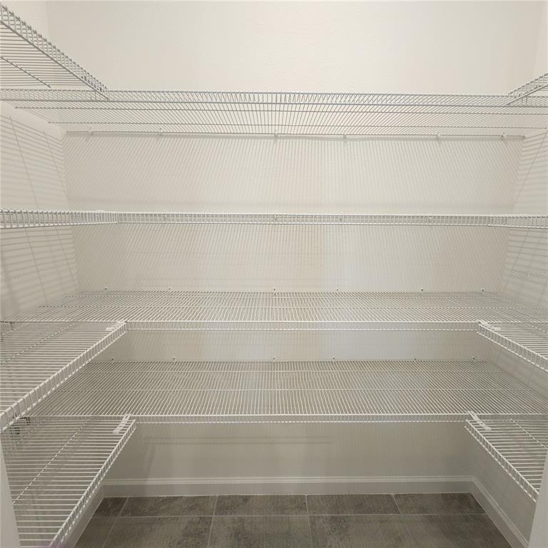 4232 Sadler Road Apopka, FL 32712 - Photo 8 of 31 a view of a closet