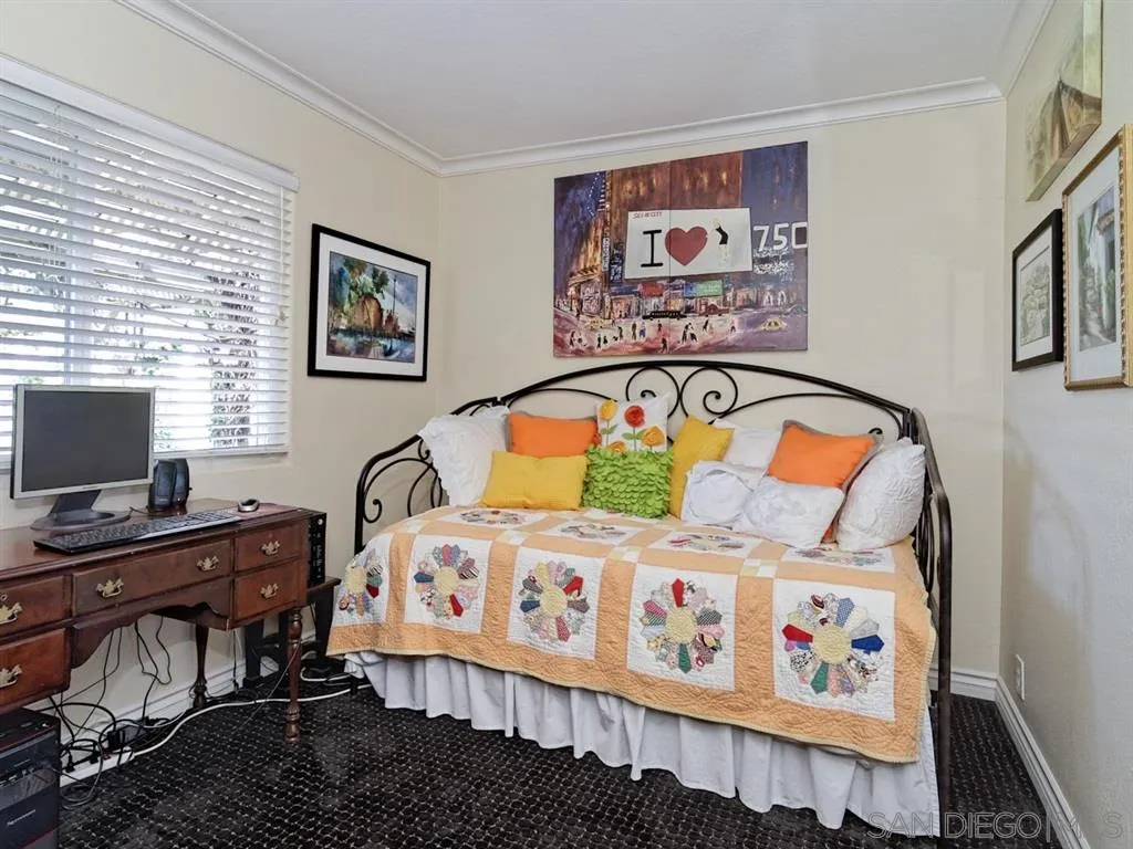 1718 West Knapp Drive Vista, CA 92083 - Photo 13 of 24 a bedroom with a bed and a desk