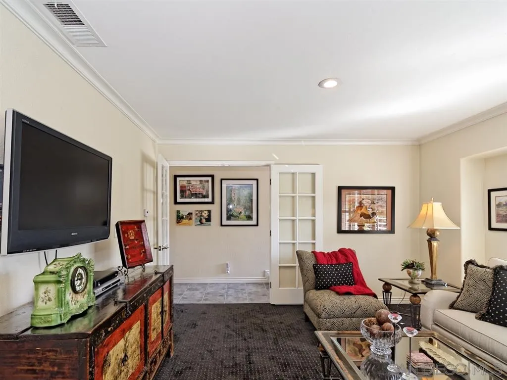 1718 West Knapp Drive Vista, CA 92083 - Photo 5 of 24 a living room with furniture and a flat screen tv