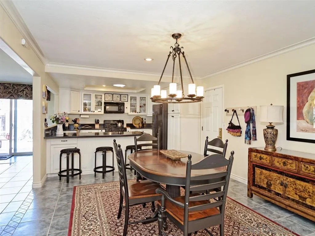 1718 West Knapp Drive Vista, CA 92083 - Photo 8 of 24 a view of a dining room with furniture