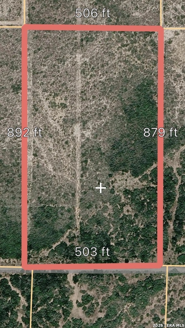 a view of a road with a sign board