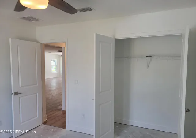 a view of a livingroom with wooden floor
