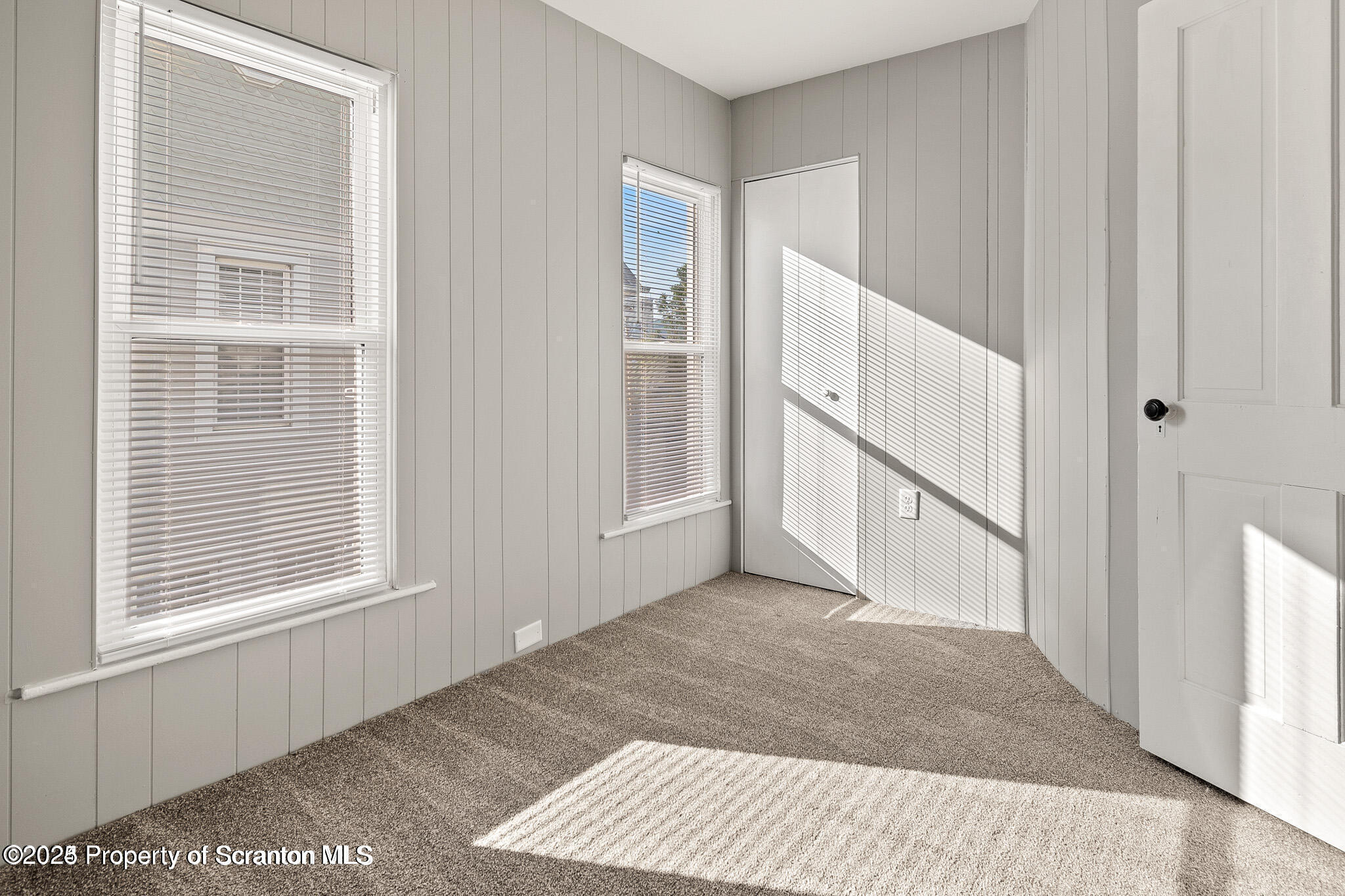 724 Electric Street Scranton, PA 18509 - Photo 11 of 17 a view of an empty room with a window