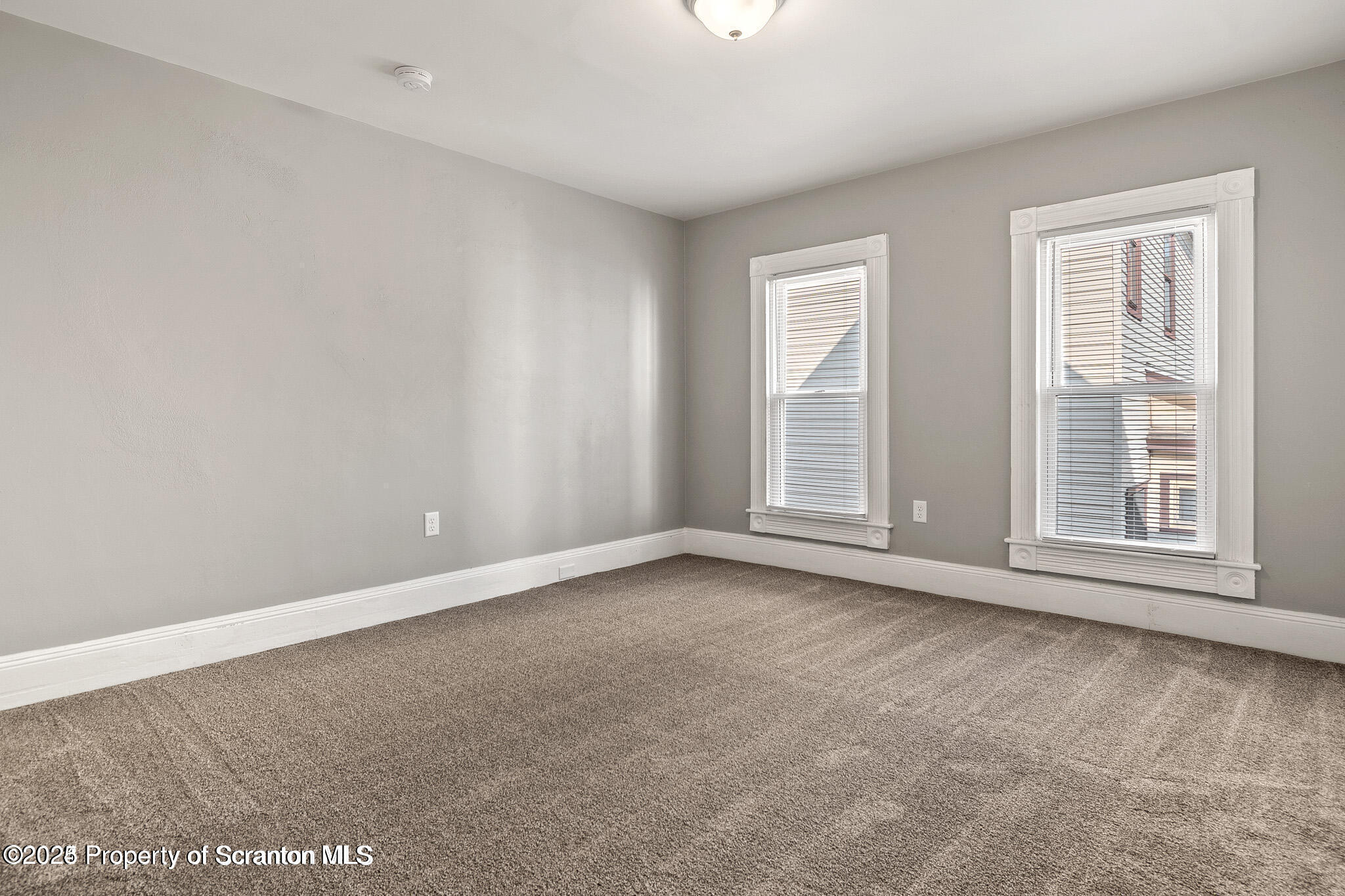 724 Electric Street Scranton, PA 18509 - Photo 14 of 17 an empty room with windows