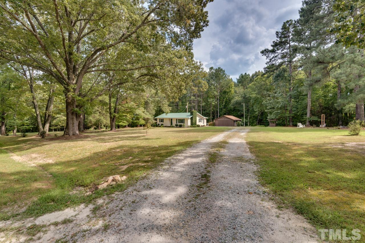 7612 Jock Road Bahama, NC 27503 - Photo 3 of 53 a view of outdoor space with trees