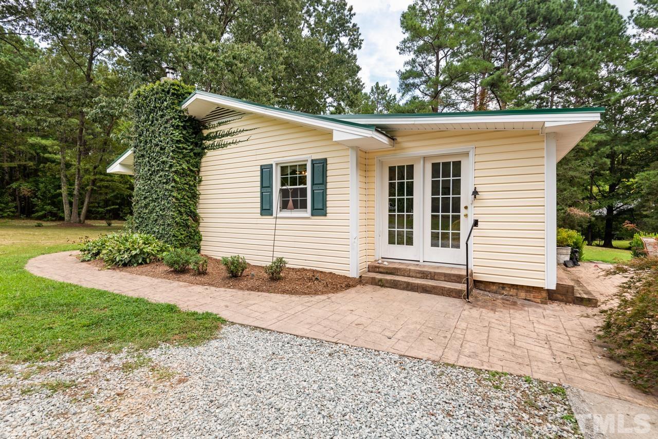 7612 Jock Road Bahama, NC 27503 - Photo 38 of 53 a view of a house with a yard