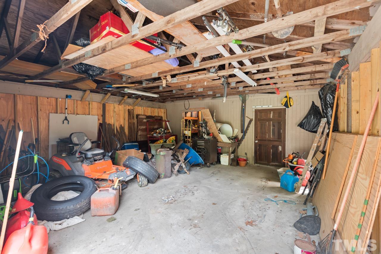 7612 Jock Road Bahama, NC 27503 - Photo 46 of 53 a view of a storage room with a lot of stuff