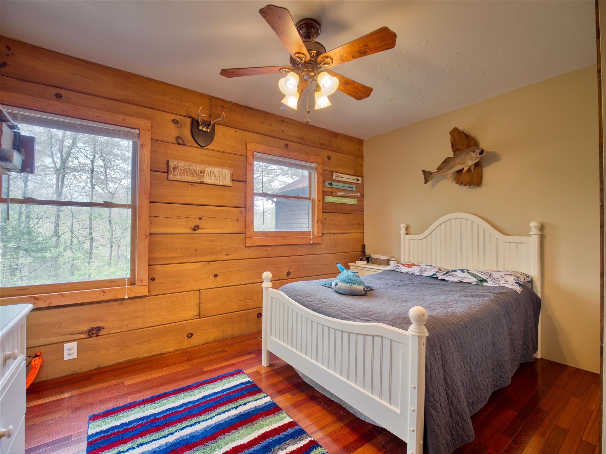 328 Charles Smith Road Lascassas, TN 37085 - Photo 14 of 26 a bedroom with a bed and a window