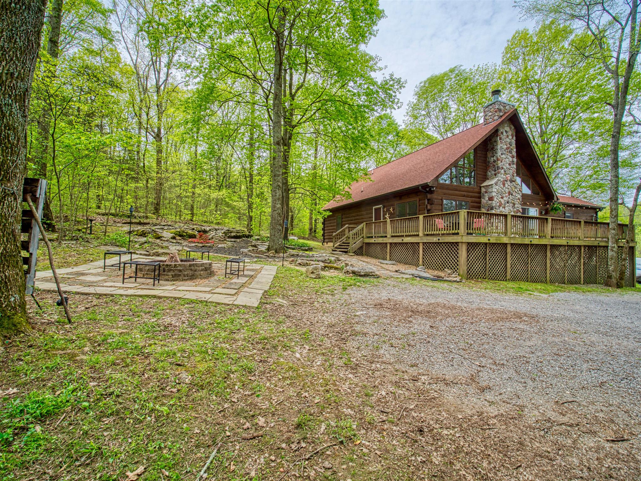 328 Charles Smith Road Lascassas, TN 37085 - Photo 23 of 26 a house with trees in the background