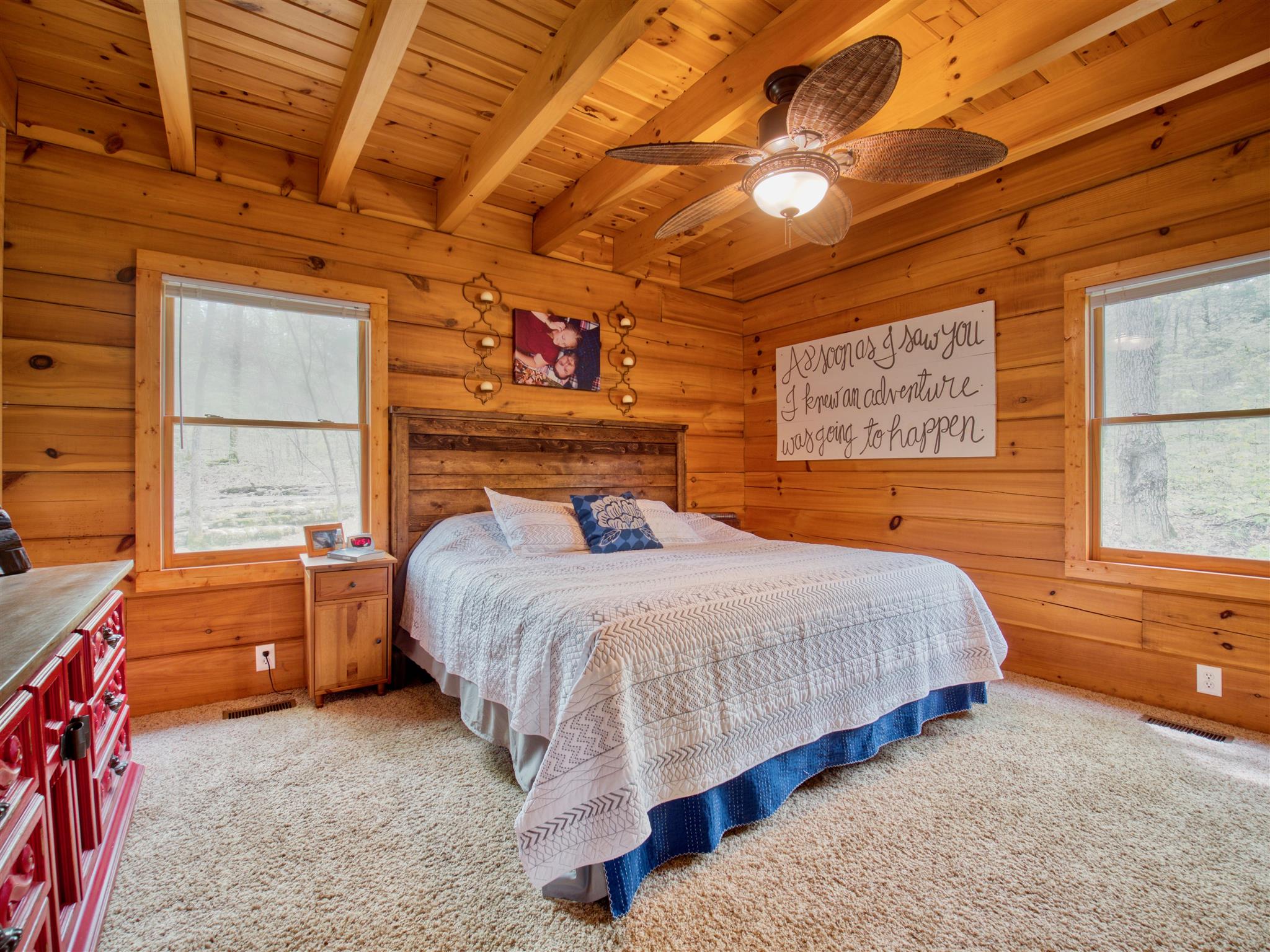 328 Charles Smith Road Lascassas, TN 37085 - Photo 8 of 26 a bed sitting in a room next to a window