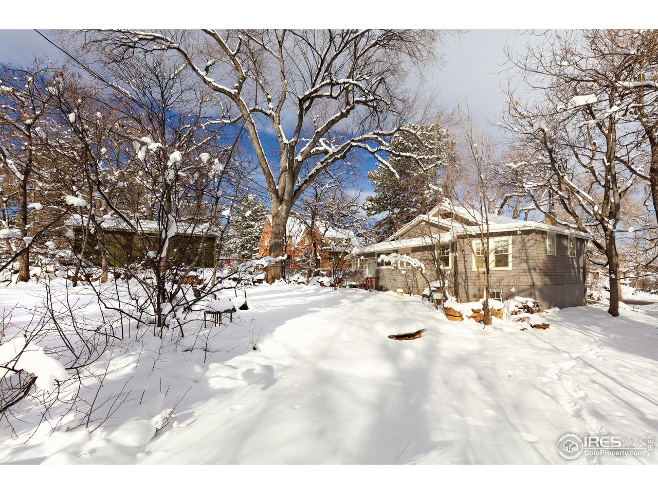 1520 Baseline Road Boulder, CO 80302 - Photo 12 of 29 a view of a house with snow on the road
