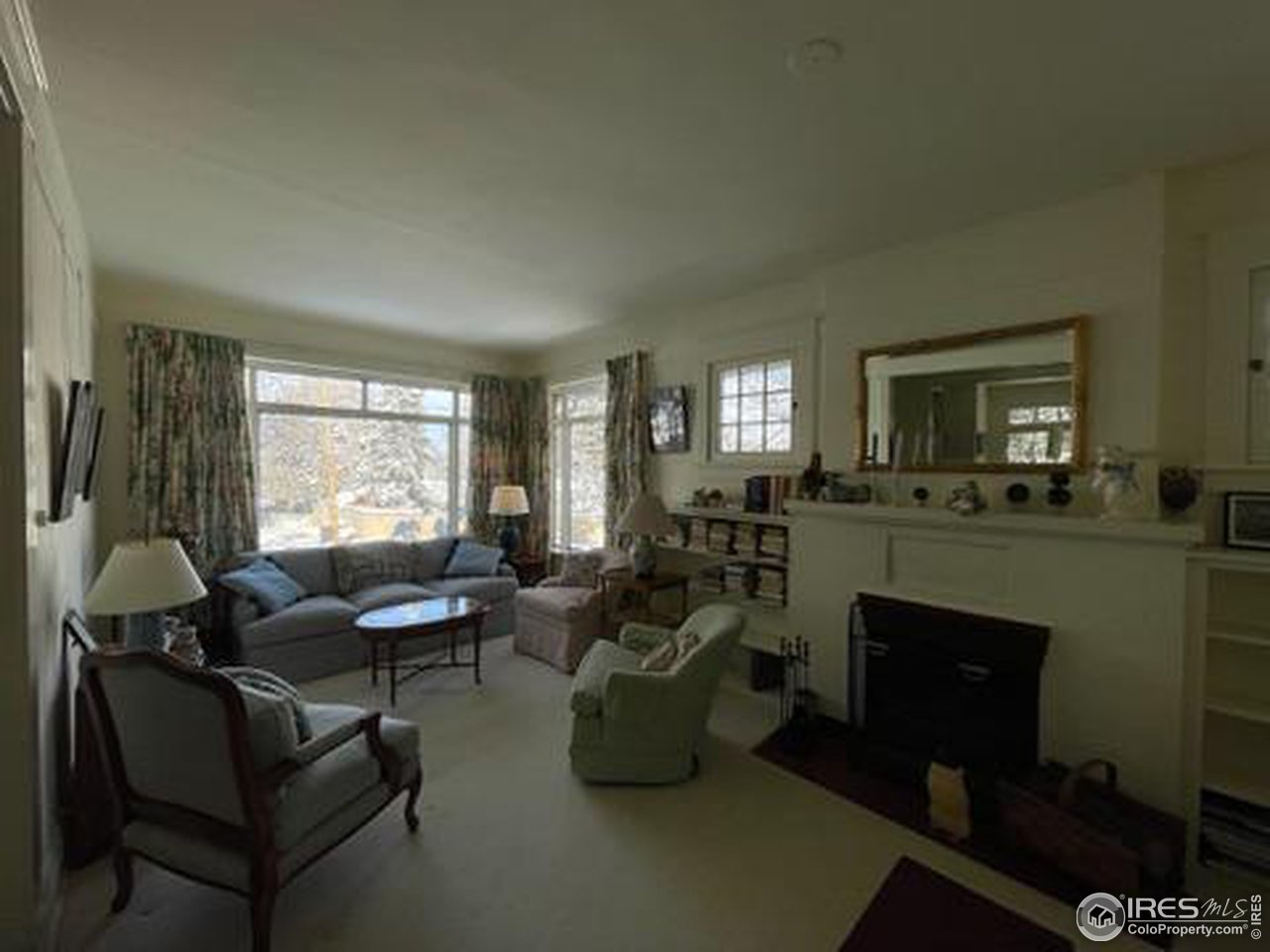 1520 Baseline Road Boulder, CO 80302 - Photo 25 of 29 a living room with furniture and a fireplace