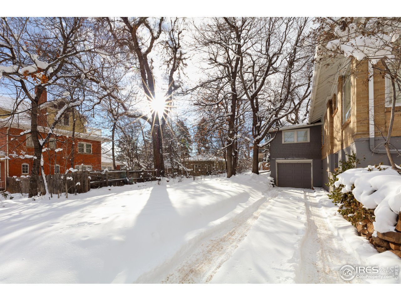 1520 Baseline Road Boulder, CO 80302 - Photo 4 of 29 a view of a white house with a snow