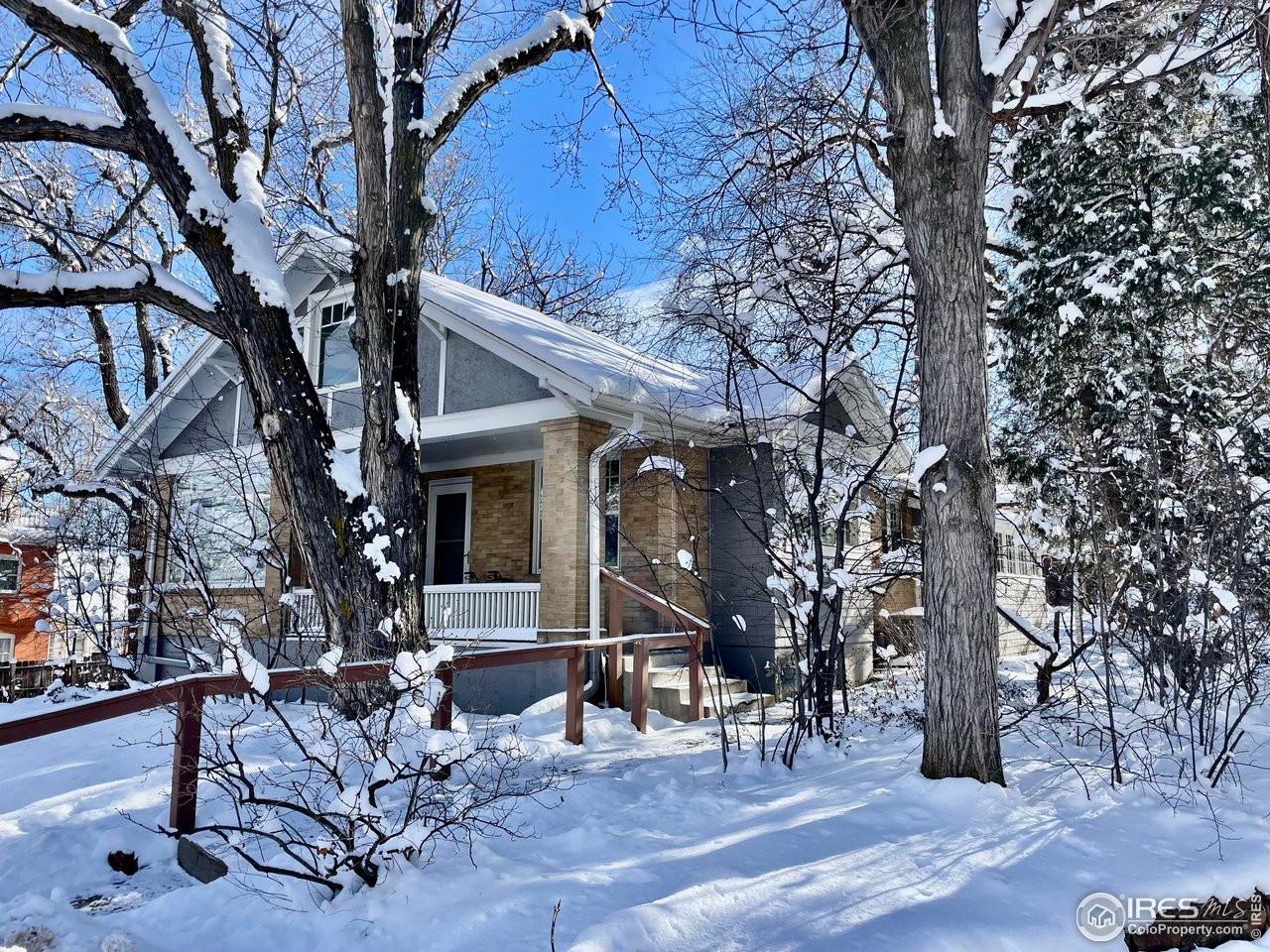 1520 Baseline Road Boulder, CO 80302 - Photo 9 of 29 a view of a chairs and tables in the patio