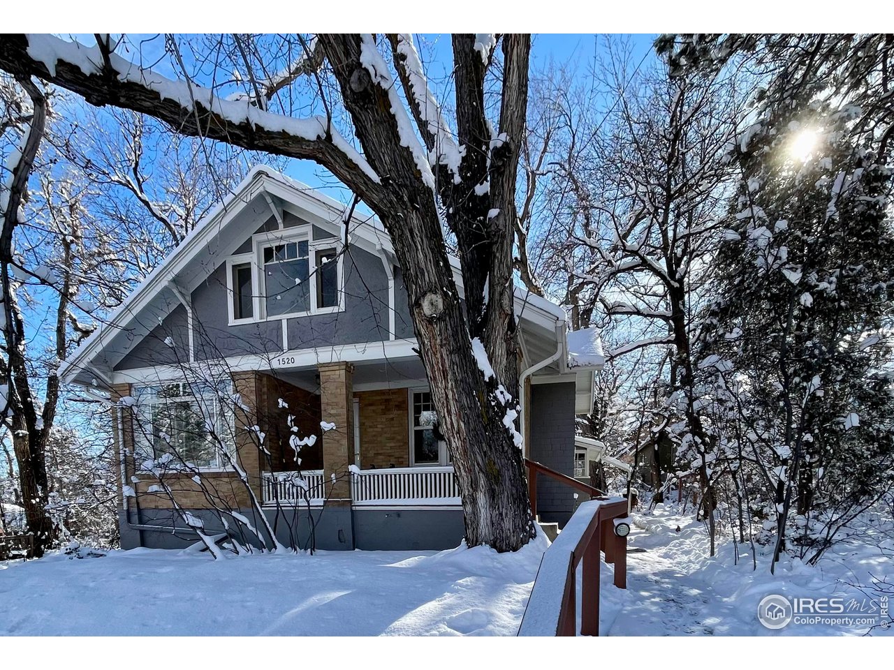 1520 Baseline Road Boulder, CO 80302 - Photo 10 of 29 a front view of a house with a tree