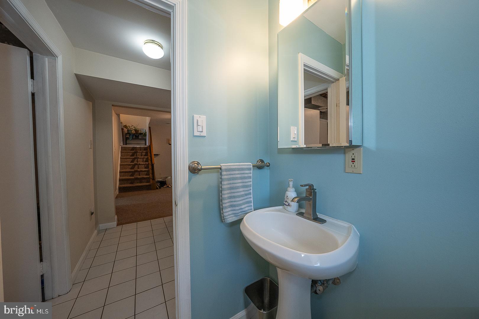 848 Mourning Dove Road Audubon, PA 19403 - Photo 50 of 86 a bathroom with a sink toilet and mirror