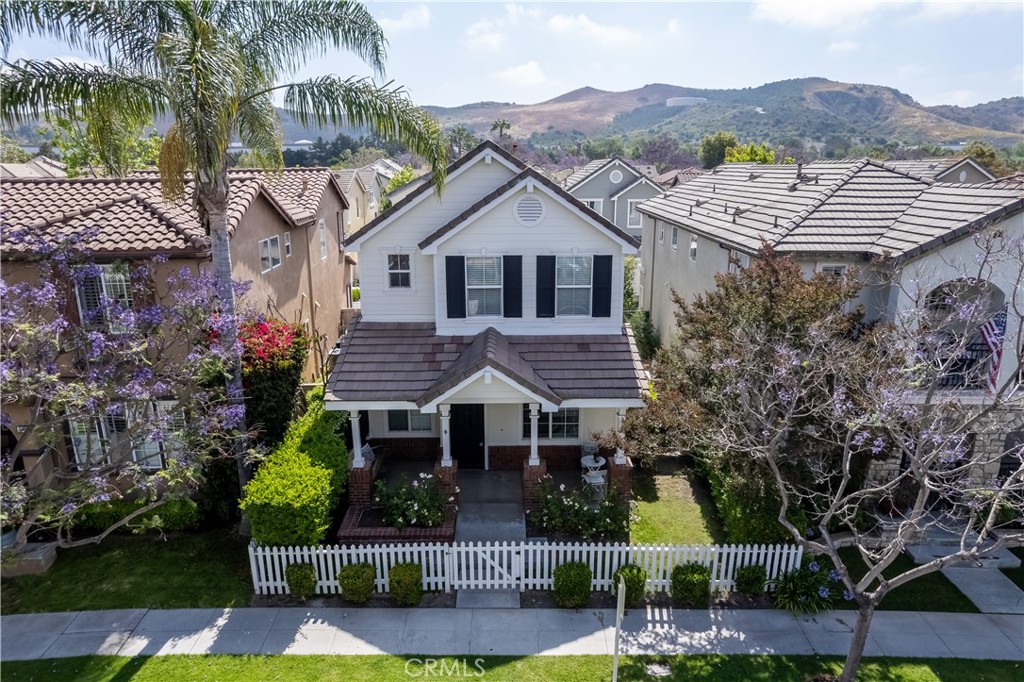 100 Main Street Ladera Ranch, CA 92694 - Photo 1 of 1 a front view of a house with a yard and palm tree