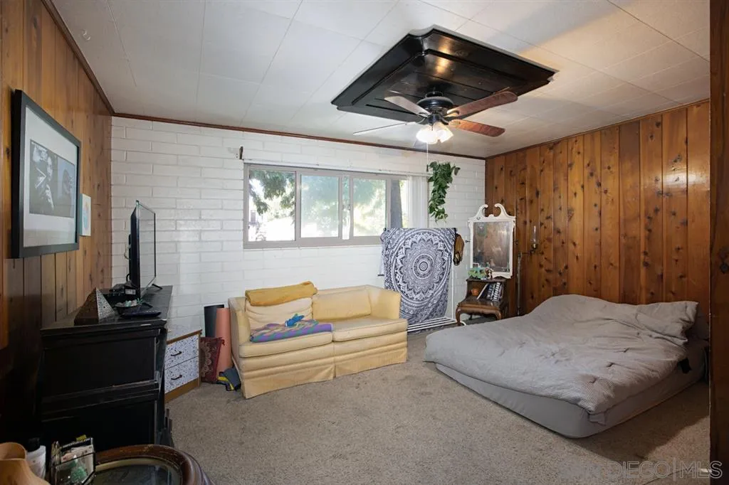 1247 Marshall Road Alpine, CA 91901 - Photo 13 of 20 a bedroom with furniture and a flat screen tv