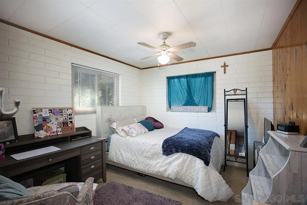 1247 Marshall Road Alpine, CA 91901 - Photo 16 of 20 a bedroom with a bed and dresser