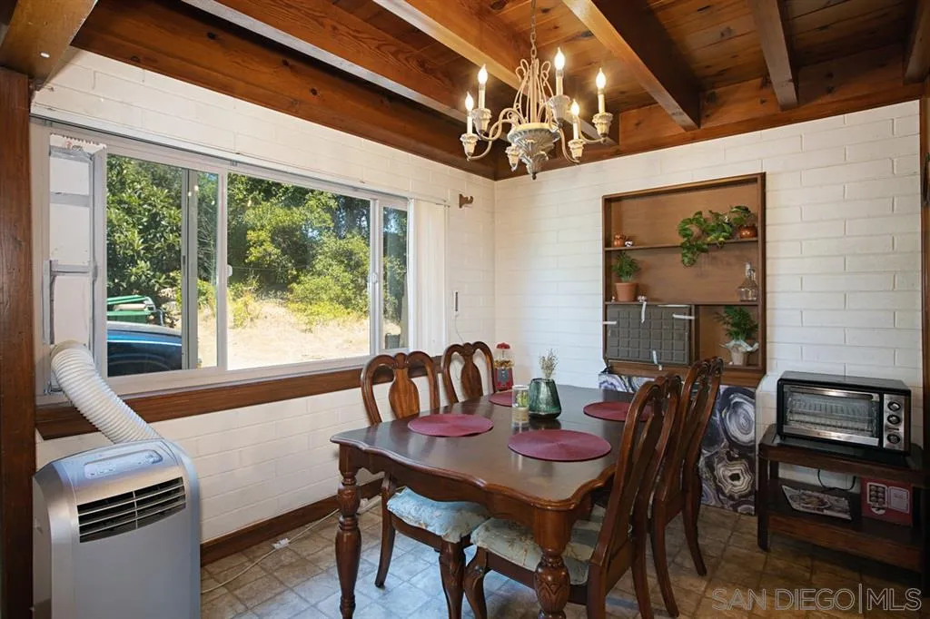 1247 Marshall Road Alpine, CA 91901 - Photo 6 of 20 a view of a dining room with furniture window and outside view