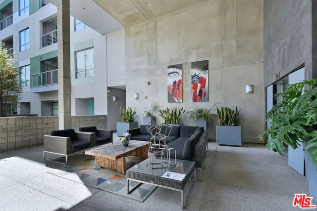 a building outdoor space with patio furniture