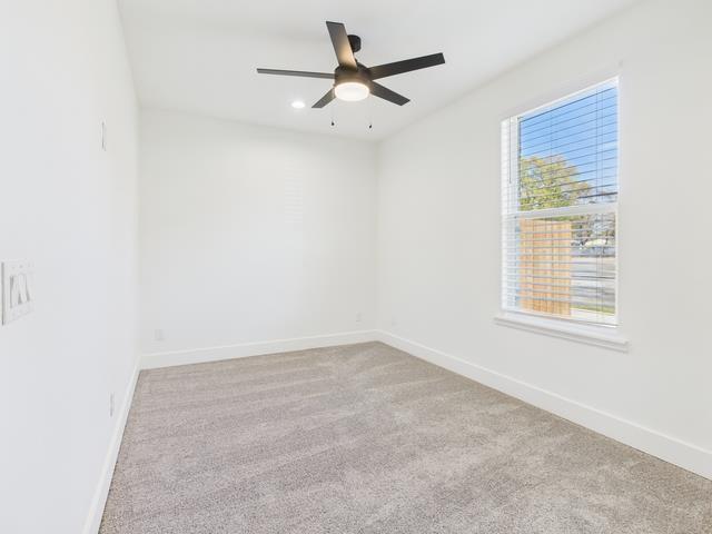 511 Richardson Street Athens, TX 75751 - Photo 24 of 40 an empty room with a window and a fan