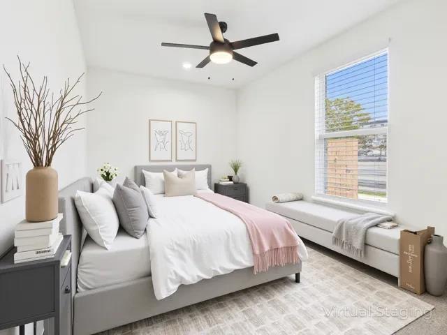 511 Richardson Street Athens, TX 75751 - Photo 25 of 40 a bedroom with a bed couch and window