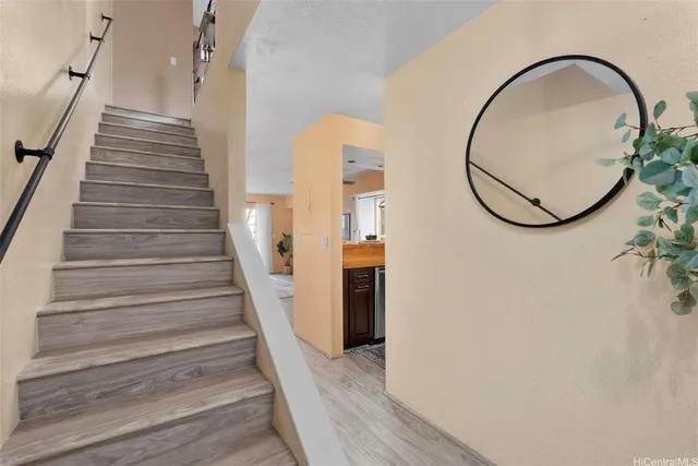 a view of entryway with wooden floor