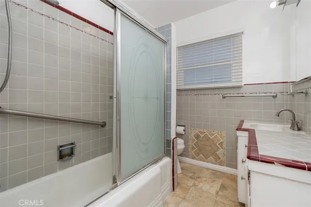 a bathroom with a sink and a shower