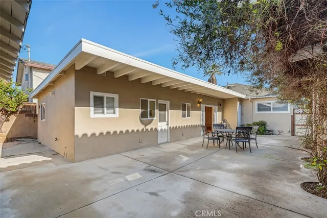 a view of a house with patio