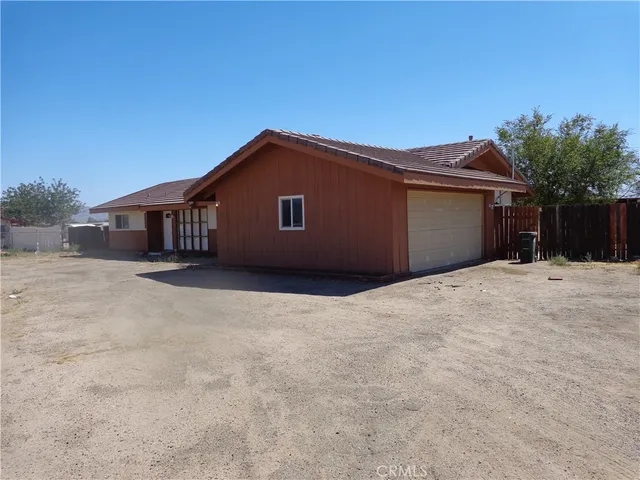 a view of room with window and fireplace