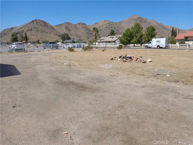 a view of a car park in front of house