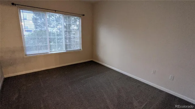 a room with a wooden cabinets