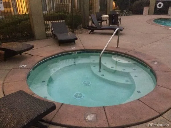 a sign board with fire pit in front of it