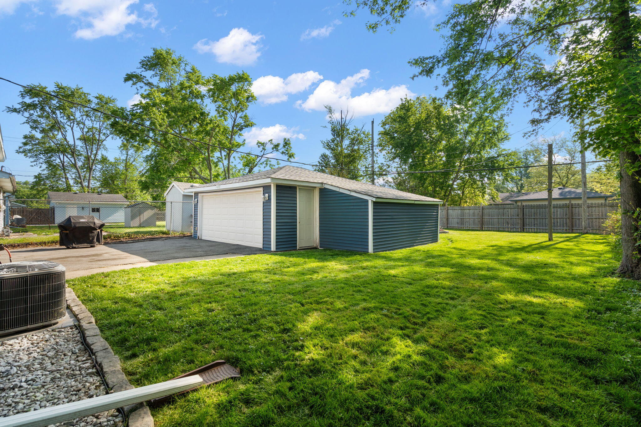 725 Juniper Road Valparaiso, IN 46385 - Photo 19 of 21 a backyard of a house with table and chairs